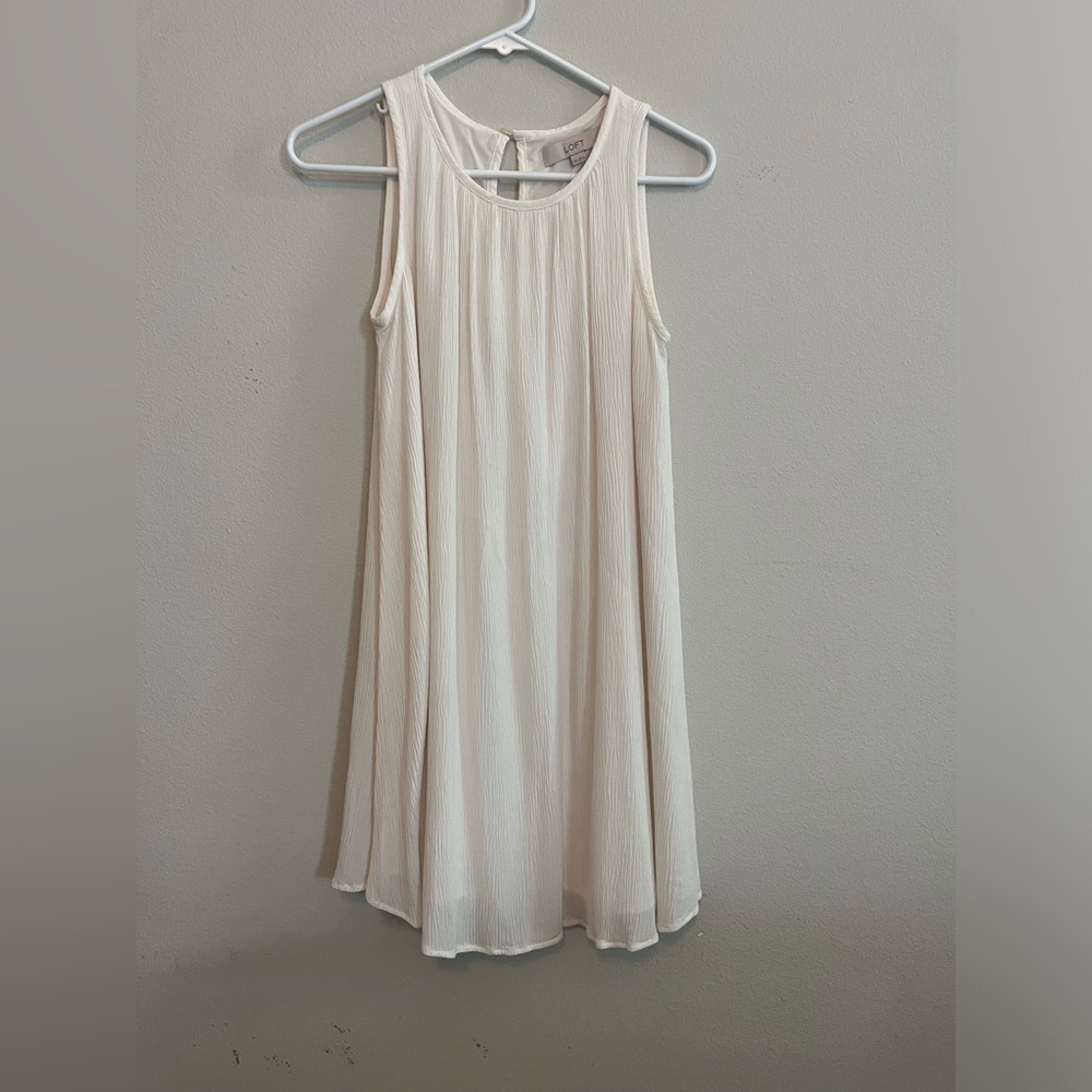 Cream sleeveless dress